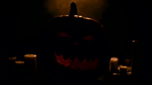 Abóbora de Halloween com velas — Vídeo de Stock