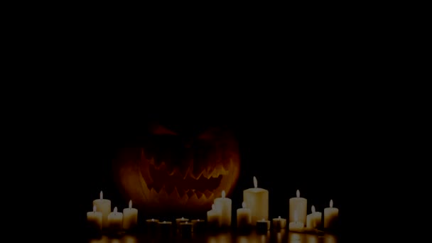 Helloween-Kürbis mit Kerzen — Stockvideo