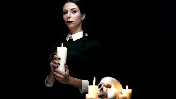 Pale girl holding candle — Stock Video