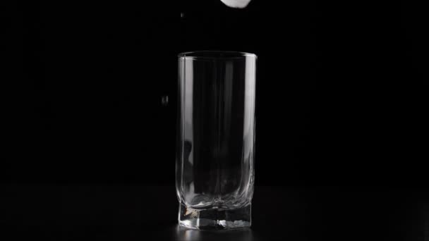 Hand of woman drop ice cubes — Stock Video