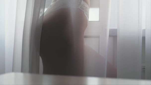 Woman near window — Stock Video