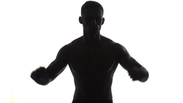 Silhouette Fit Man Visar Dubbel Biceps Vit — Stockvideo
