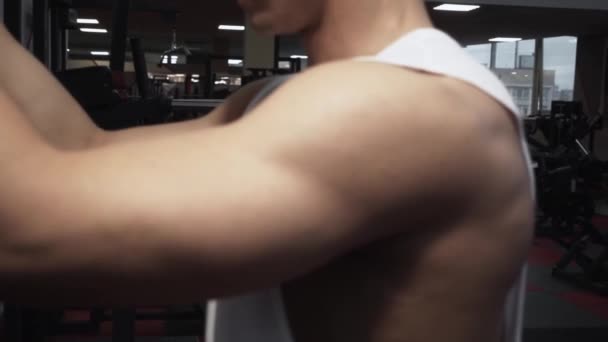 Triceps workout in gym machine — Stock video