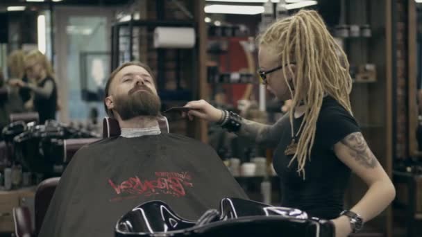 Handsome Bearded Man Styling Young Woman Dreadlocks Slow Motion Shot — Stock Video
