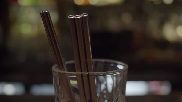 Steel Straws Glass Slider Shot Shallow Depth Field — Stock Video