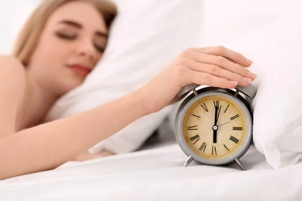 Young Woman Alarm Clock Lying Bed Home — Stock Photo, Image