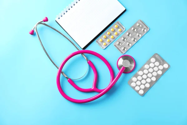 Stethoscope Pills Notebook Color Background Health Care — Stock Photo, Image