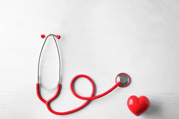 Stethoscope Red Heart White Wooden Background Health Care Concept — Stock Photo, Image