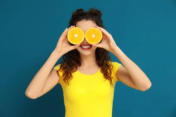 Cute Young Woman Halves Orange Color Background — Stock Photo, Image