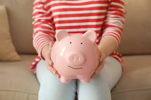 Young Woman Holding Piggy Bank Indoors Money Savings Concept — Stock Photo, Image