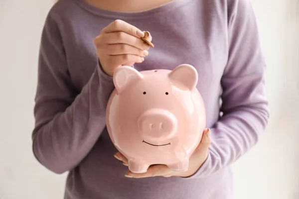 Woman Putting Coin Piggy Bank Money Savings Concept — Stock Photo, Image
