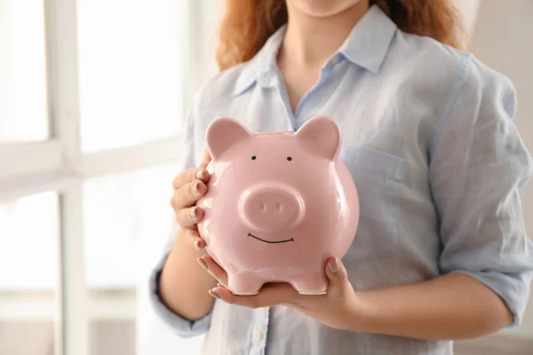 Young Woman Holding Piggy Bank Indoors Money Savings Concept — Stock Photo, Image