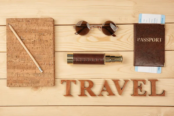 Word Travel Made Letters Tourist Stuff Wooden Background Top View — Stock Photo, Image