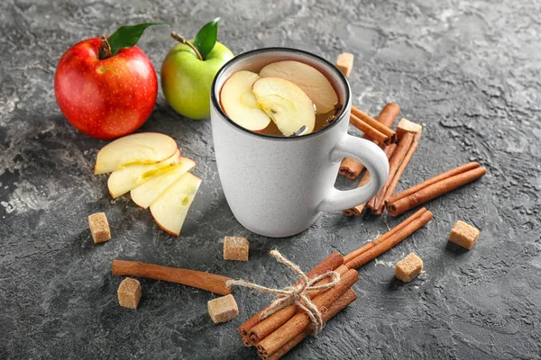 Composition Cup Fresh Apple Water Cinnamon Sticks Textured Background — Stock Photo, Image