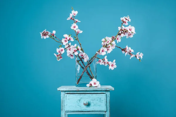 Vase Beautiful Blossoming Branches Table Color Background — Stock Photo, Image