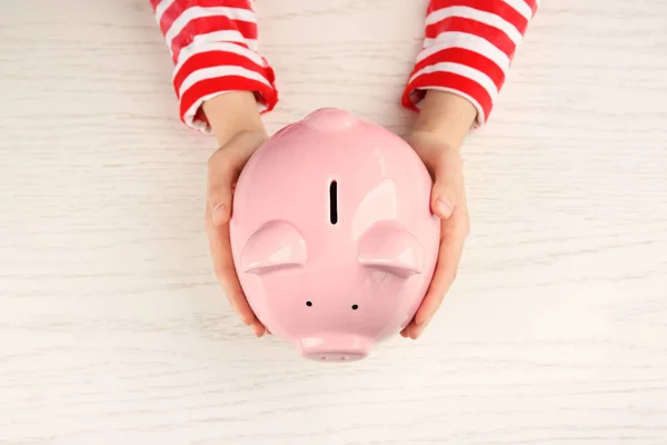 Woman Piggy Bank Wooden Background — Stock Photo, Image