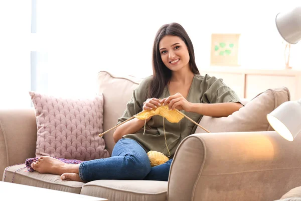 Young Woman Sitting Sofa Knitting Warm Sweater Indoors — Stock Photo, Image