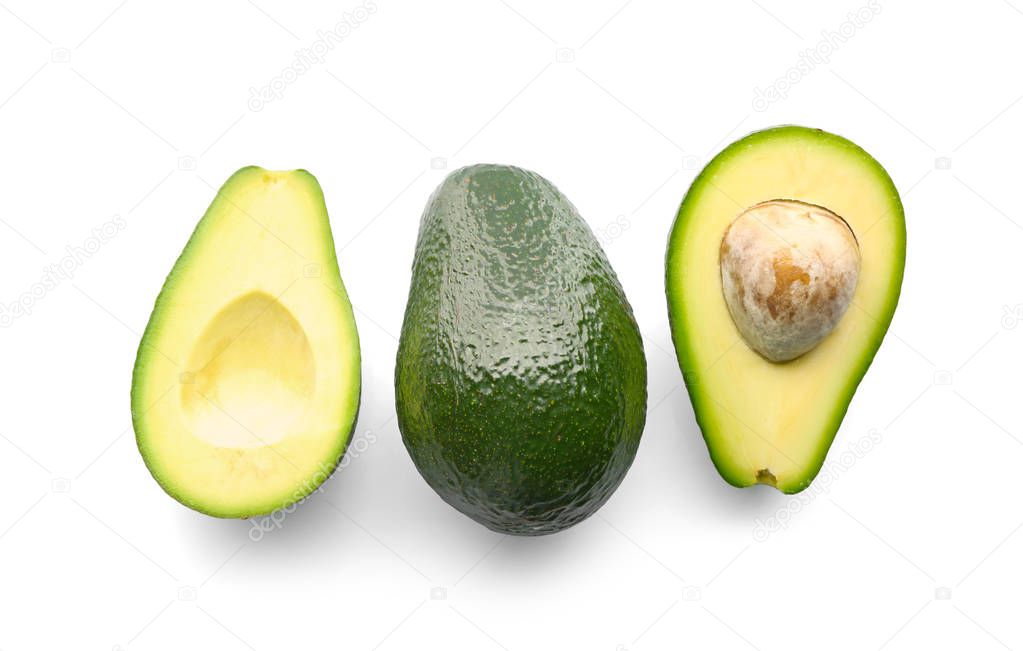 Fresh avocados on white background