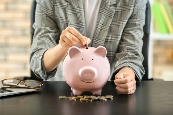 Woman Putting Money Piggy Bank Savings Concept — Stock Photo, Image