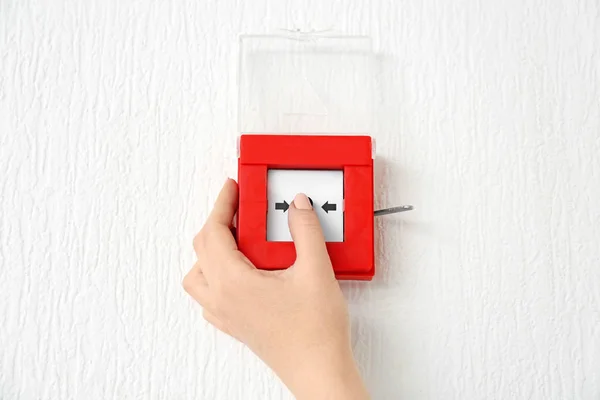 Young Woman Using Fire Alarm System Indoors — Stock Photo, Image