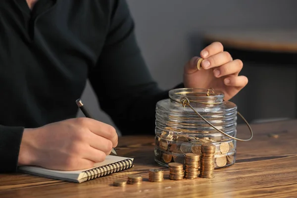 Man Counting His Savings Table — Stock Photo, Image