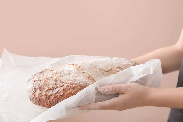 Woman Holding Fresh Tasty Bread Color Background Closeup — Stock Photo, Image