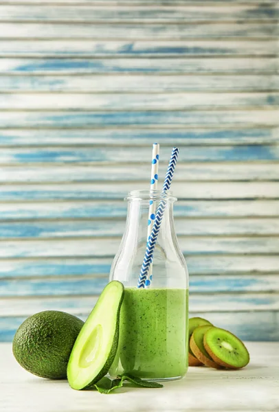 Bottle Tasty Avocado Smoothie Fresh Fruits Wooden Table — Stock Photo, Image