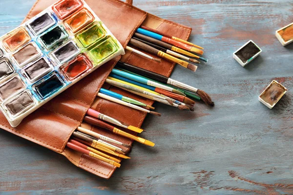 Bag Paint Brushes Watercolors Wooden Table — Stock Photo, Image