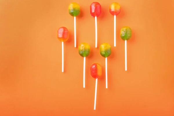 Lollipops Doces Saborosos Fundo Cor Leigos Planos — Fotografia de Stock