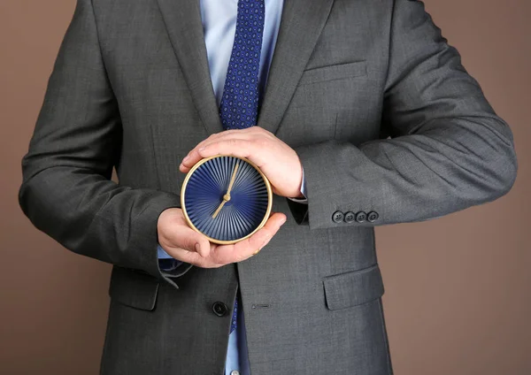 Man Holding Alarm Clock Color Background Time Management Concept — Stock Photo, Image