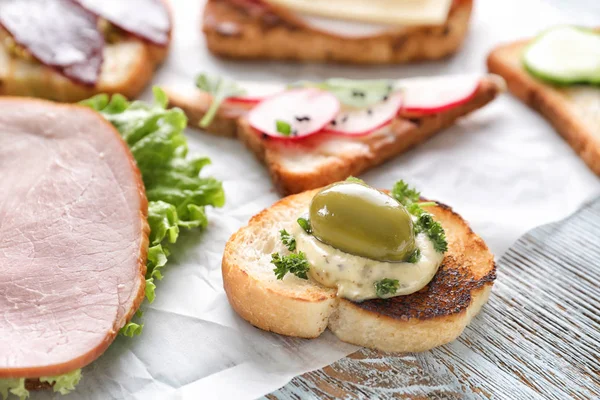 Different Delicious Toasts Table — Stock Photo, Image