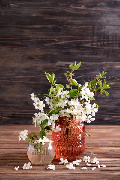 Vases Beautiful Blossoming Branches Wooden Table — Stock Photo, Image