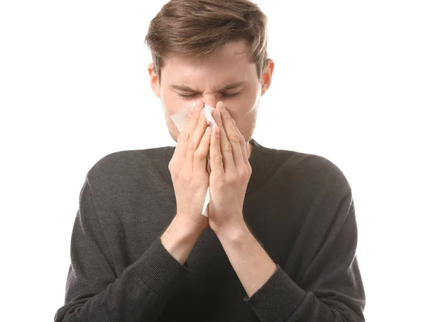 Junger Mann Mit Nasenwischer Auf Weißem Hintergrund Allergiekonzept — Stockfoto