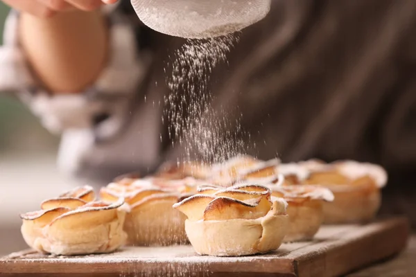 Woman Sprinkling Apple Roses Puff Pastry Sugar Powder Kitchen Closeup — Stock Photo, Image