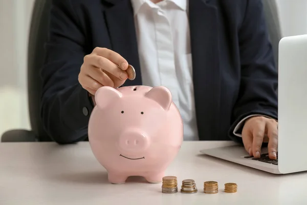 Woman Putting Money Piggy Bank Savings Concept — Stock Photo, Image