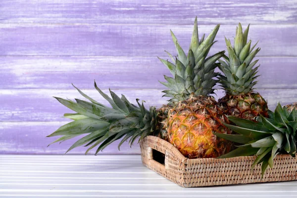 Wicker Tray Delicious Pineapples Table Wooden Background — Stock Photo, Image