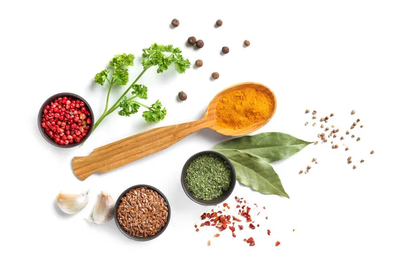 Composition with various spices on white background