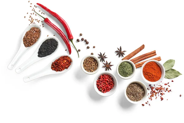 Composition with various spices on white background