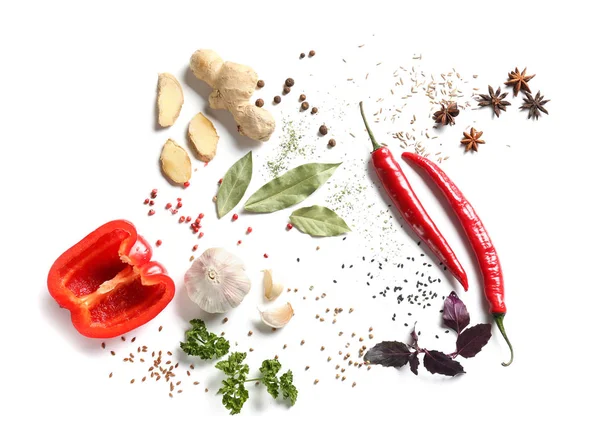 Composition with various spices on white background