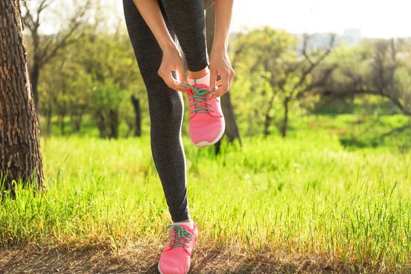 Sporty Young Woman Tying Shoelaces Running Park — Stock Photo, Image