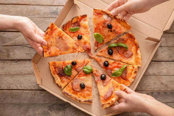 Women Taking Pieces Tasty Pizza Carton Box Top View — Stock Photo, Image