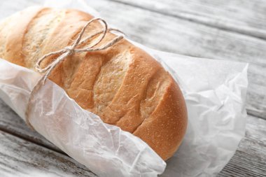 Ahşap zemin, closeup üzerine taze lezzetli ekmek