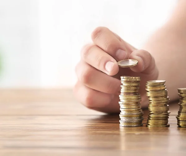 Man Stacking Coins Table Savings Concept — Stock Photo, Image