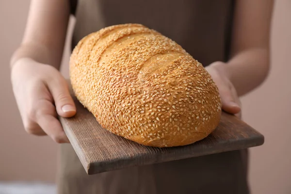 Woman Holding Board Fresh Tasty Bread Closeup — Stock Photo, Image
