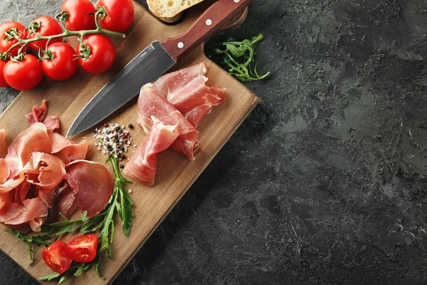 Wooden Board Tasty Prosciutto Slices Tomatoes Table — Stock Photo, Image