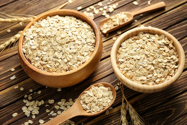 Cuencos Con Copos Avena Sobre Mesa Madera — Foto de Stock