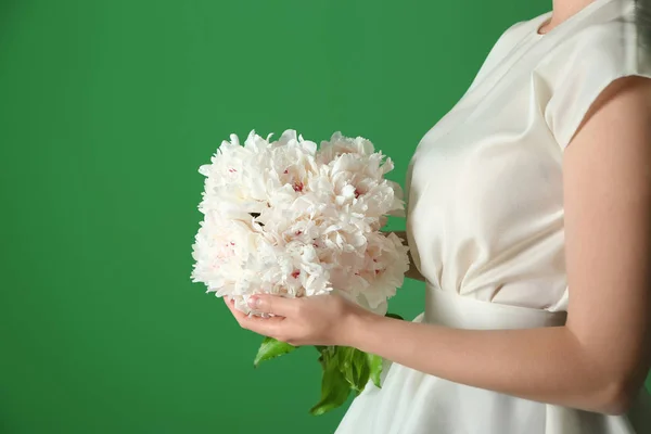 Young Woman Holding Beautiful Peonies Color Background — Stock Photo, Image