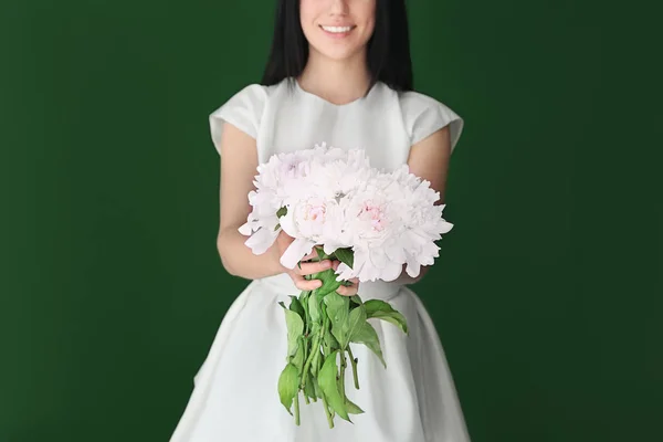 Young Woman Holding Beautiful Peonies Color Background — Stock Photo, Image