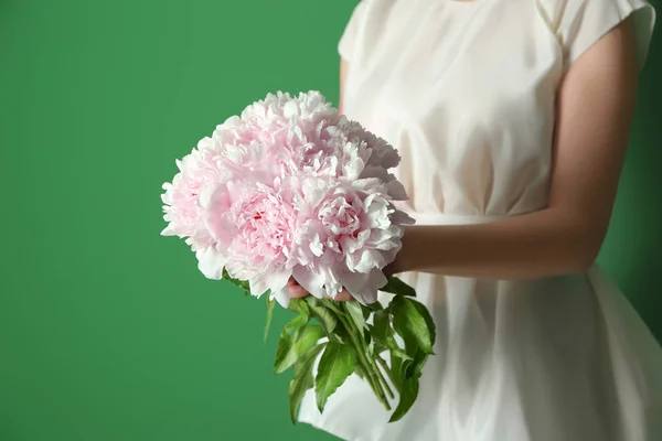 Young Woman Holding Beautiful Peonies Color Background — Stock Photo, Image