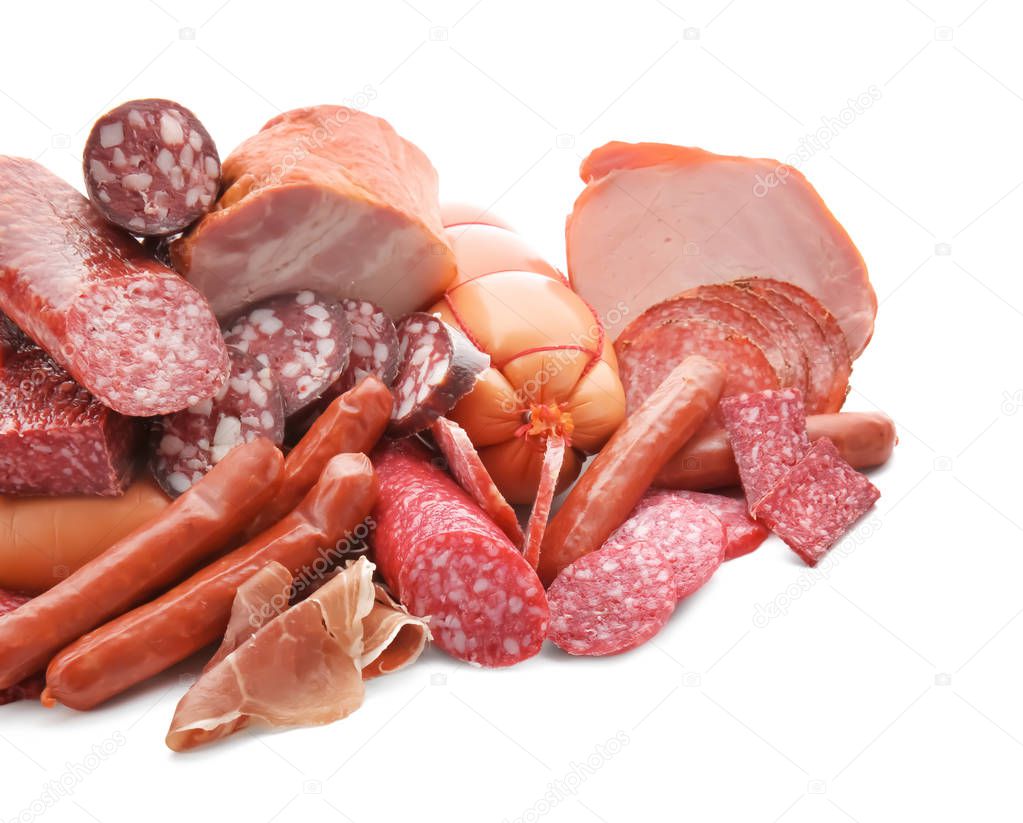 Assortment of delicious deli meats on white background